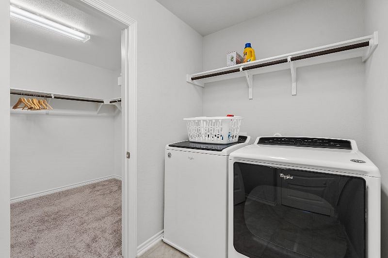 Washer & Dryer included in Laundry Room on upper level