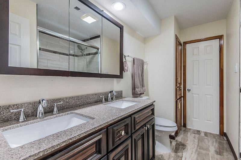 Part b of guest bathroom with dual sink.