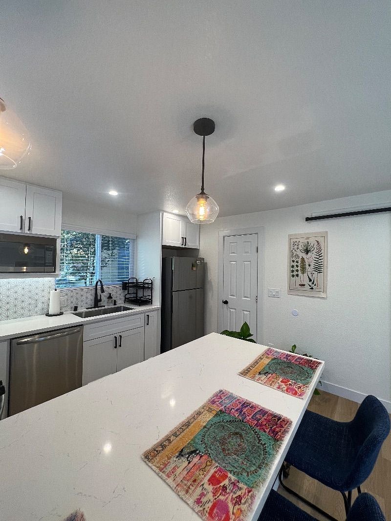 Walk-in pantry through pictured door.