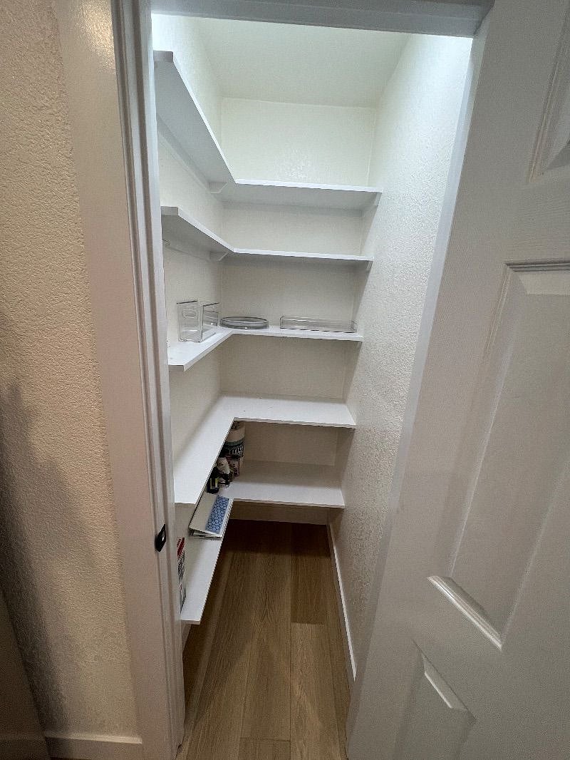 Walk-in kitchen pantry.