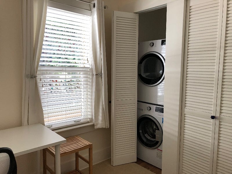 Washer and dryer are in a closet in the back bedroom