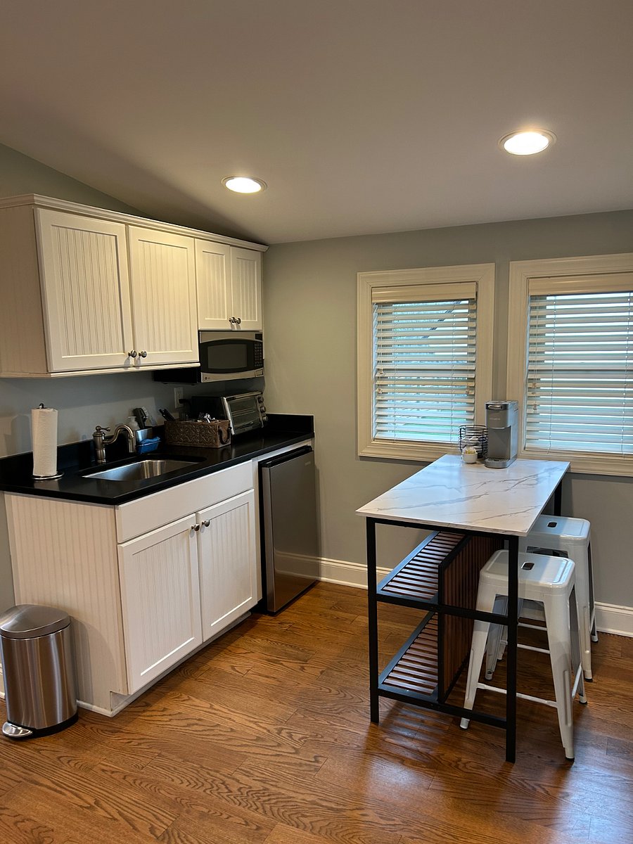 Kitchenette w/ microwave, sink, toaster oven, and small refrigerator (no stovetop, oven or dishwasher)