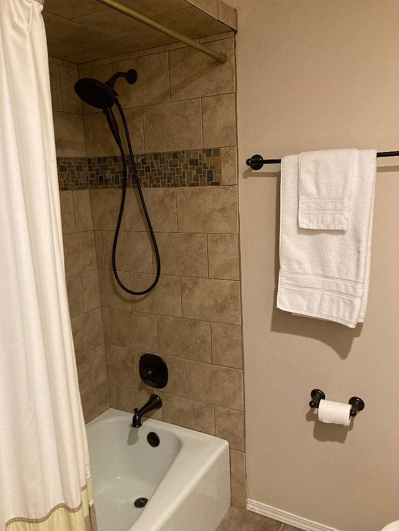 Hall bathroom includes tub and a shower with great water pressure.