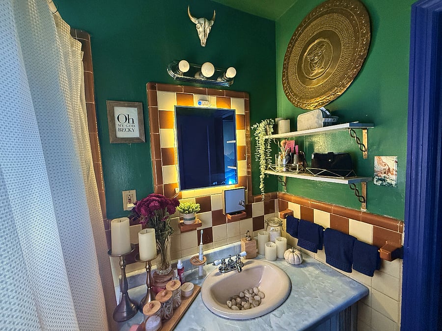 Bathroom view. There is a shelf for storing all your personal items. Additional amenities include q-tips, cotton rounds, dental floss picks, mouthwash tabs & soap. There is a first aid kit under the sink in the cabinet.