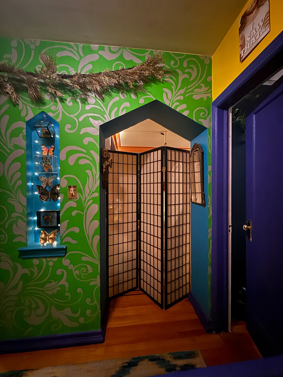 View of lounge hallway and lounge area. A tri-fold privacy screen is available for overnight guests