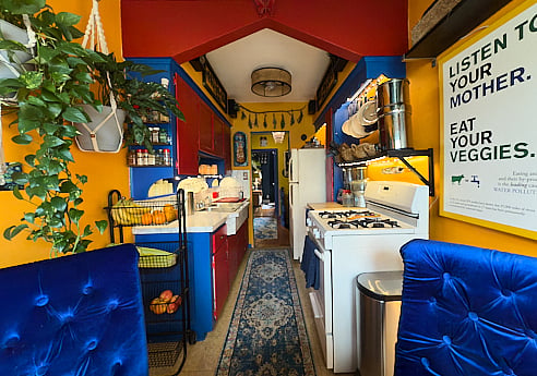 View of kitchen from dining table
