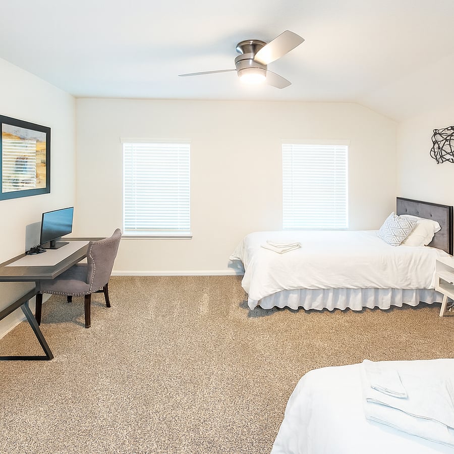 This sun-filled bedroom is perfect for friends or family with two twin XL beds (memory foam mattresses). Personalize your comfort with a ceiling fan remote and dimmable light. Plus easy-access electrical outlets for all your devices.