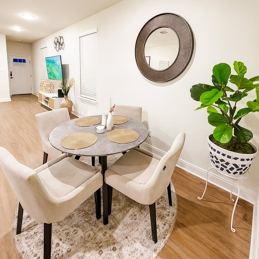 Dine with a view. Enjoy meals in this beautifully decorated dining area featuring views of the backyard and open field. Adjust the blinds to let in plenty of natural light or create a cozy ambiance.
