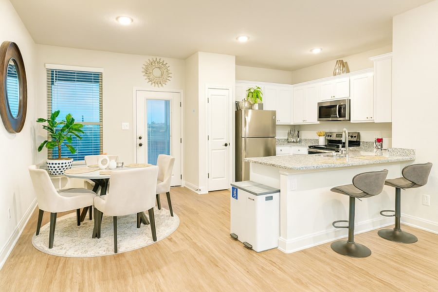 Dine with a view. Enjoy meals in this beautifully decorated dining area featuring views of the backyard and open field. Adjust the blinds to let in plenty of natural light or create a cozy ambiance.