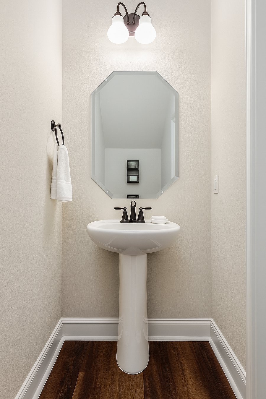 Conveniently located half-bath (toilet and sink) in the common area for easy access.