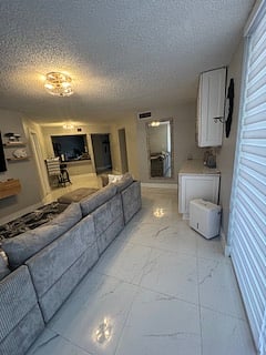 Living area with view of hallway