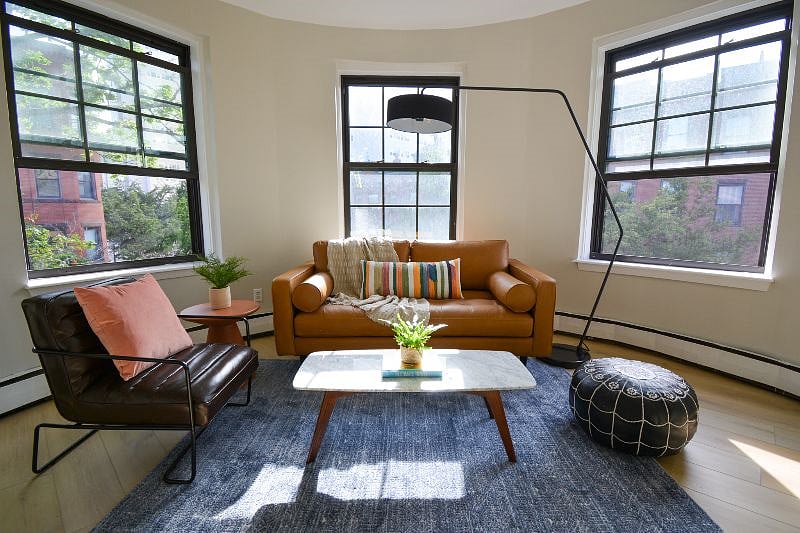 One of our larger studio lay outs, this one has a living area with open layout kitchen, and a sleeping alcove that is separate from the living space, but technically isnt a bedroom since there is no door.