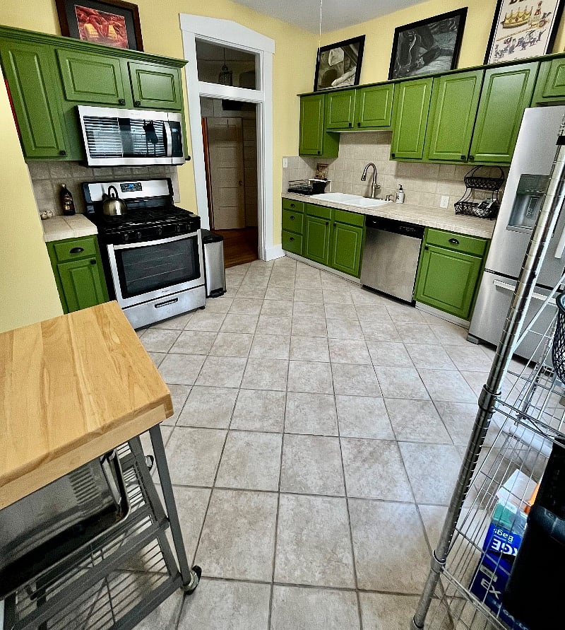 Kitchen is loaded w/stainless steel appliances (fridge, microwave, oven, dishwasher) and a walk-in pantry. Fully stocked with all you need to make yourself at home -just bring your own groceries.