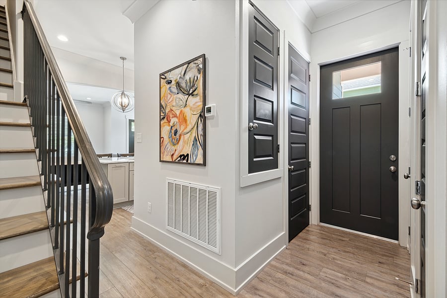 Hall to porch, W/D on left, two closets on right