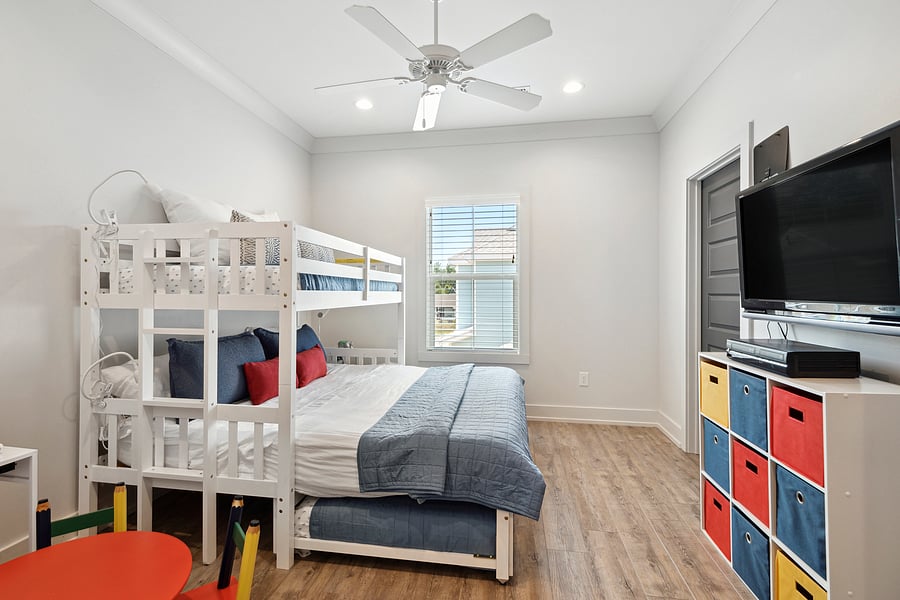 2nd upstairs BR suite or Movie DVD/VHS area, kids hangout, or adult king. Trundle pull out. Or just collapse to regular bunk with kids table moved to large closet.