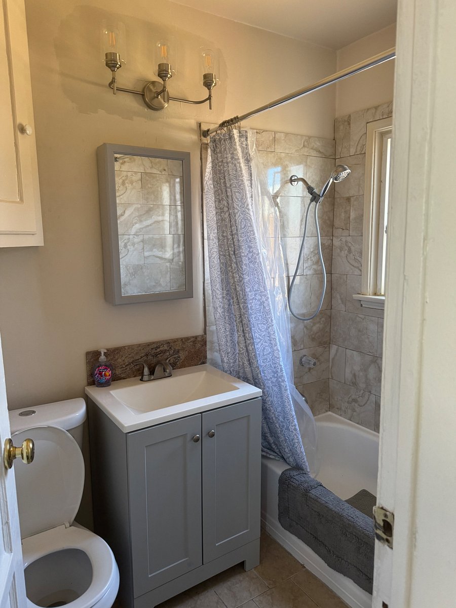 Newly remodeled bathroom, shower, tub and vanity.