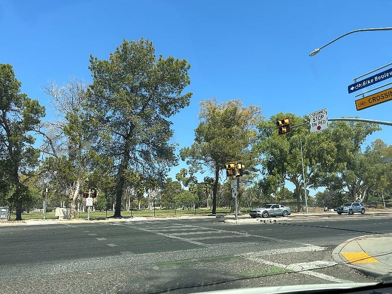 One block away from a crosswalk to the largest park in Tucson with bike and walking paths