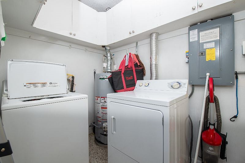 laundry room behind kitchen