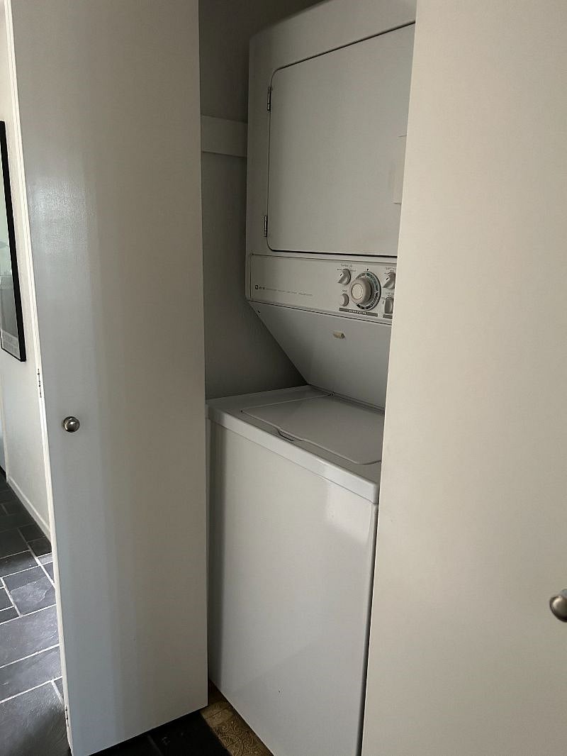 Stacking washer and dryer in hall closet
