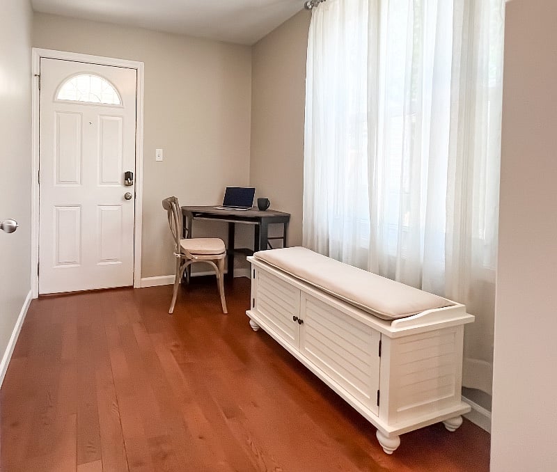 Mud Room in the back of the house has a desk and provides separate hall access to the primary suite