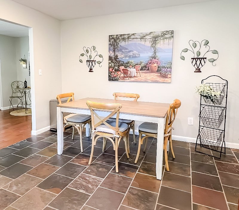 Eat-in kitchen table is set for 4 but can fit 6 chairs. The 2nd bedroom and the mud room desk have spare chairs that can be used