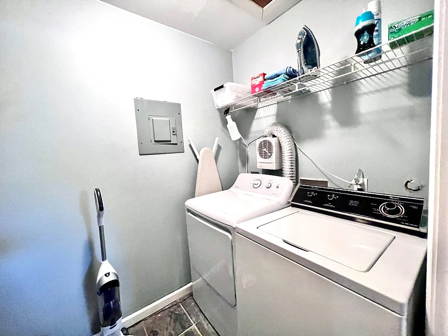 laundry closet conveniently located off of main hallway