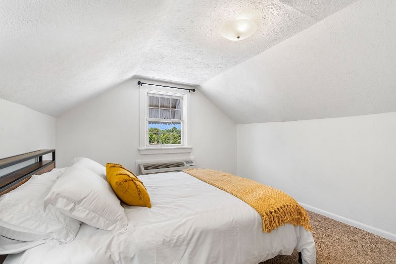 Upstairs Bedroom queen with quarter bath in room and split unit HVAC