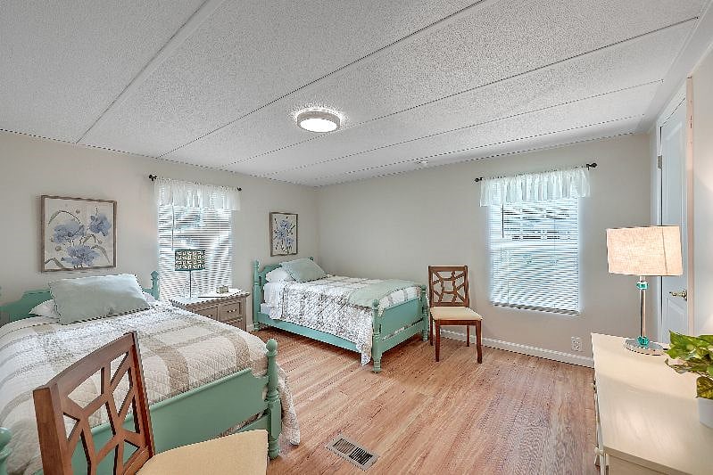 Third bedroom with two twin beds. 