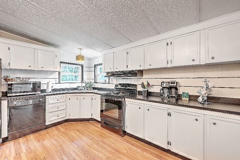 Kitchen with windows over the sink. 