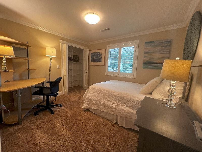 Bedroom 3 (Photo 1), queen bed. All bedding provided. Housecleaning every 2 weeks - vacuum and will change sheets. Desk/Monitory, office chair, desk lights, Floor lamp, large closet.