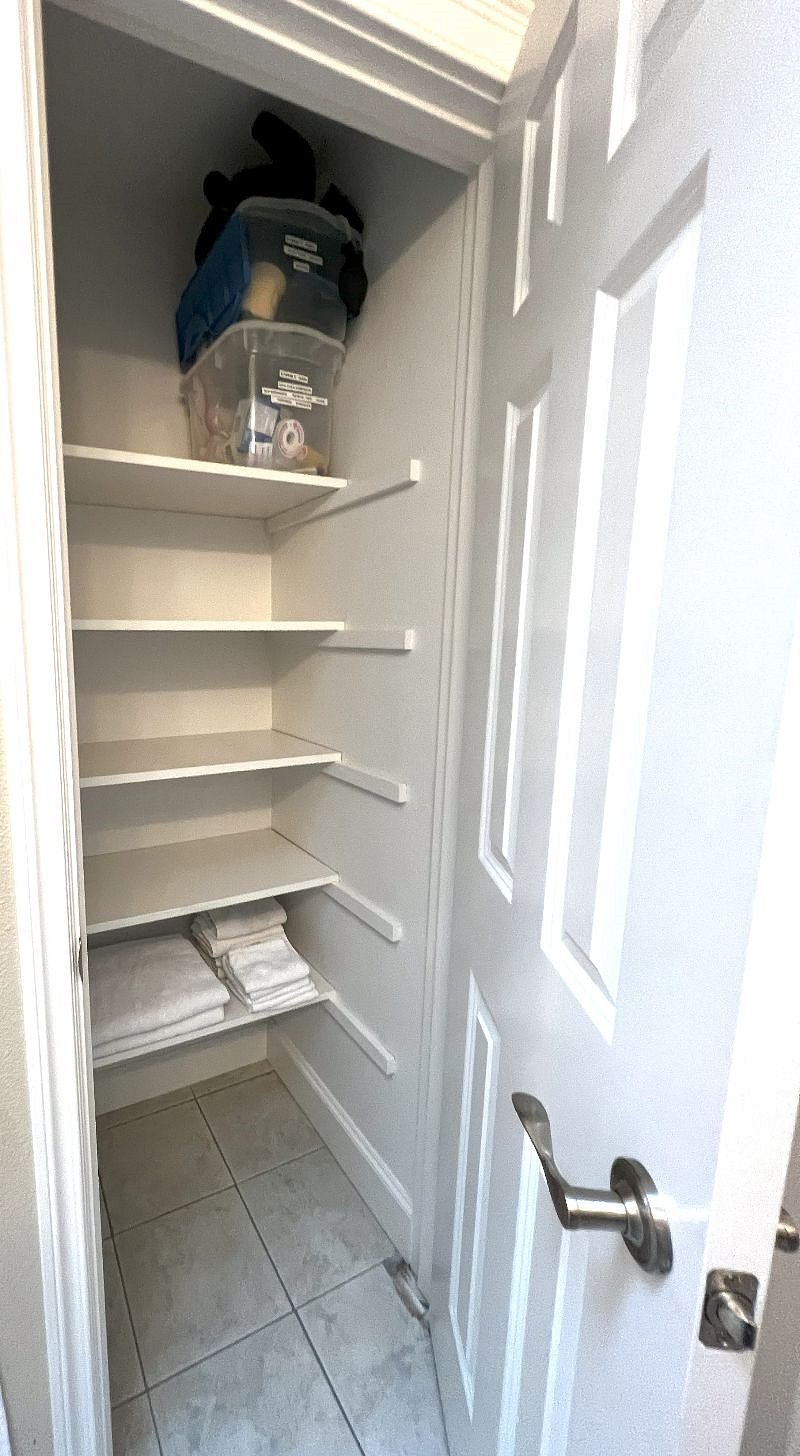 Additional Storage spaces in hallway bathroom.