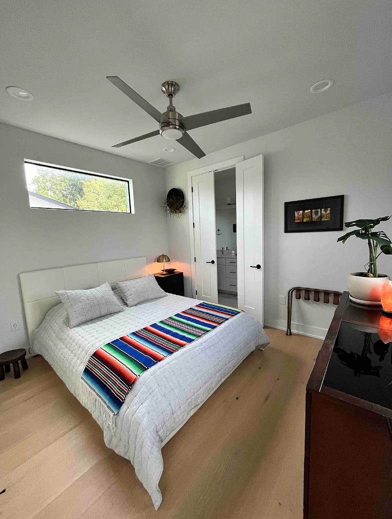 Master bedroom with an en suite bathroom.