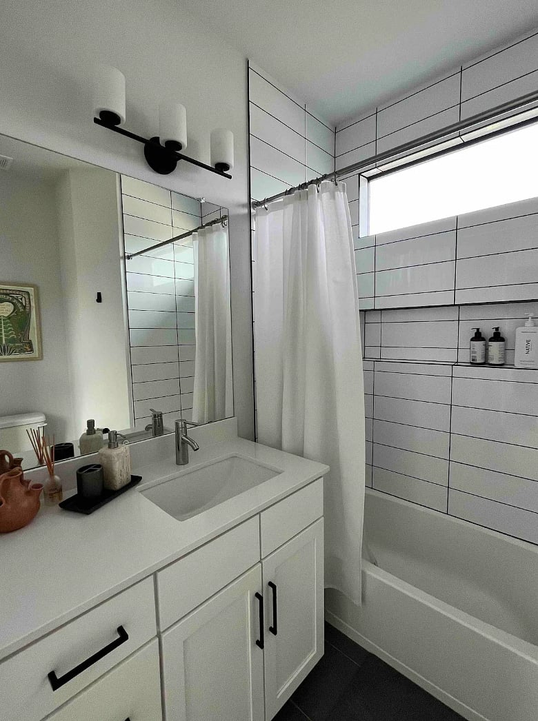 Second full bathroom accessible from the upstairs hallway.