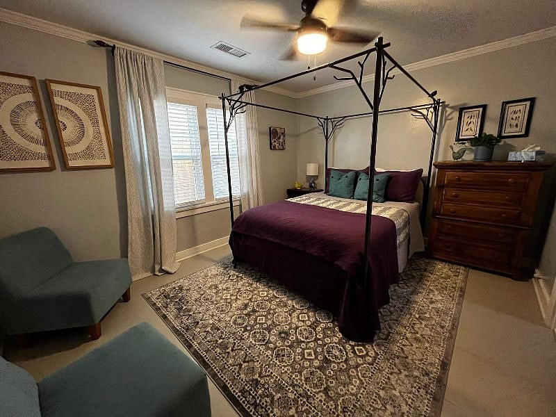 Bedroom #3 with closet and window, faces east. Room darkening curtains and blinds. 