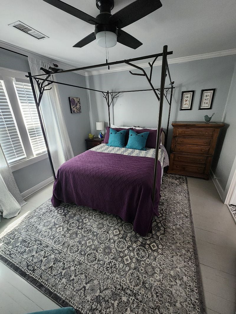 Bedroom #3 with closet and window, faces east. Room darkening curtains and blinds. 