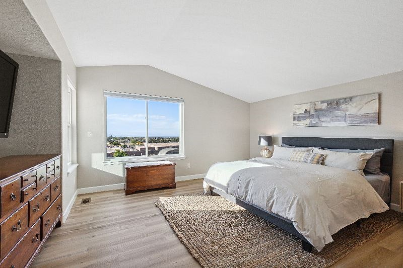 Primary bedroom with king size mattress, blackout power shade, walk-in closet and second closet, 2 separate sinks, soaking tub, shower,