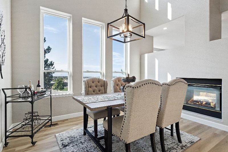 Dining Room w/gas fireplace and views of Downtown Denver on a clear day! Evening lights of DTC and Downtown.