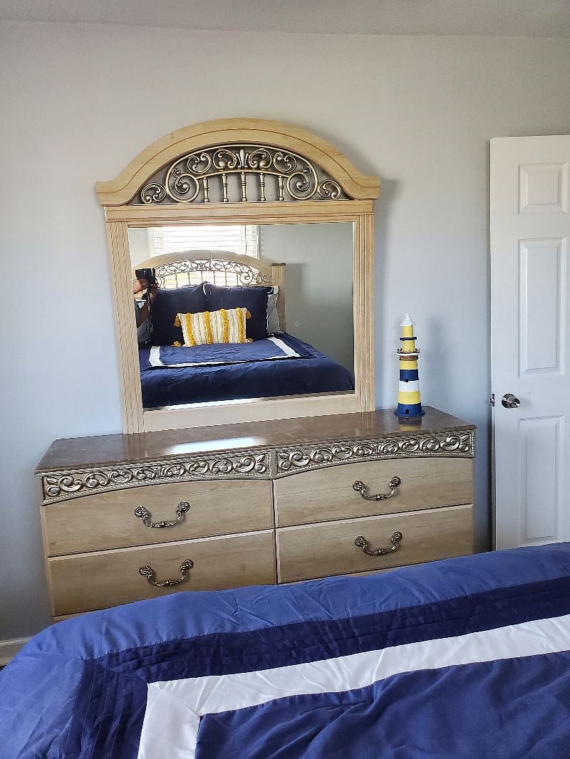Primary room has a queen sized bed.