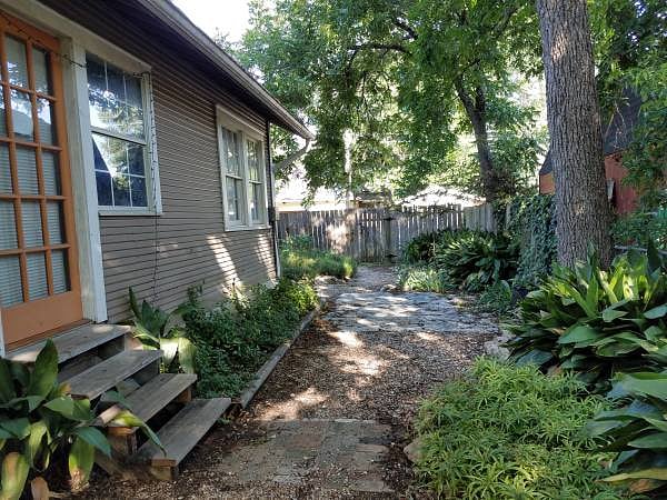 Side yard, visible from kitchen and Bedroom 1