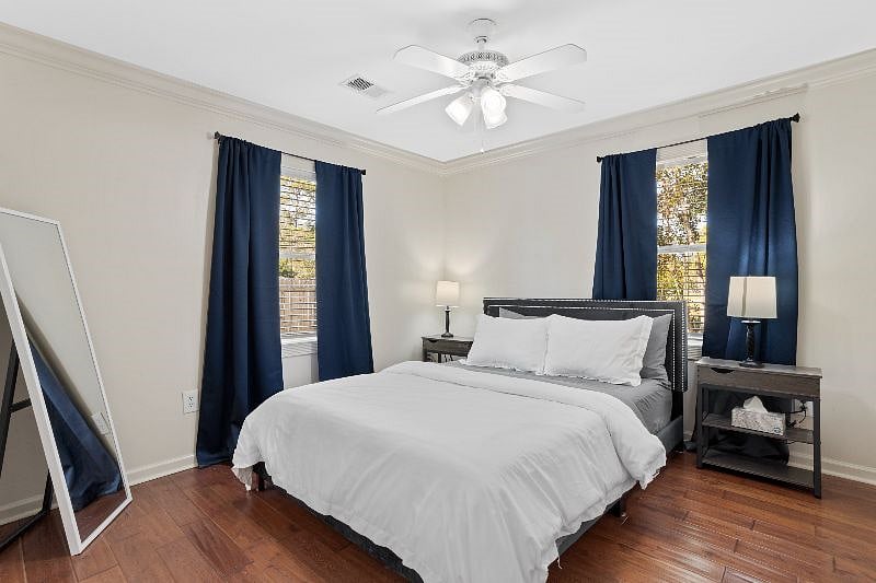 2nd bedroom with built-in plugin night stands to charge cell phones or other electronic devices.  