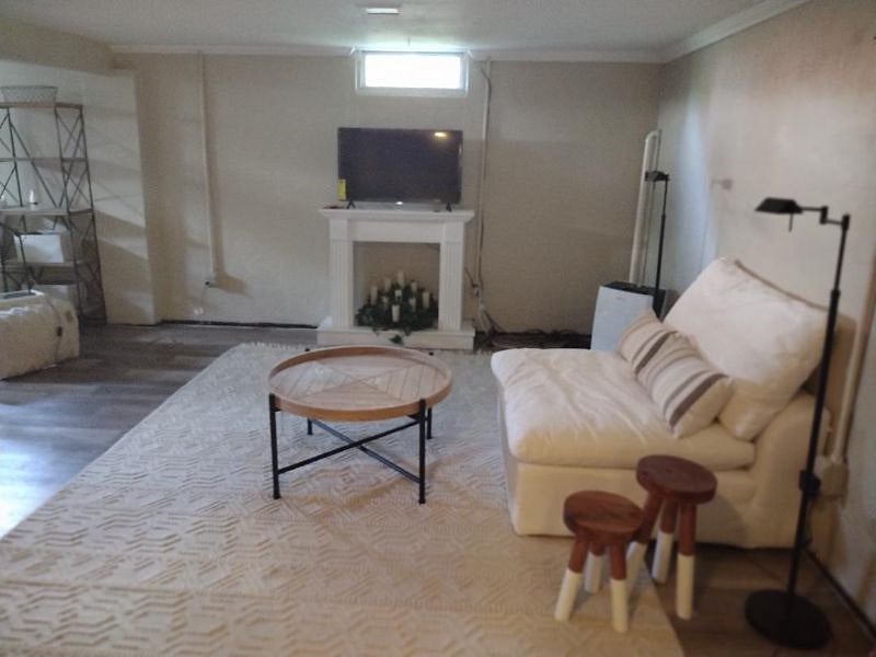 Lower Level Living Area Living Room with 1 Gig Internet Service and TV and Playroom 