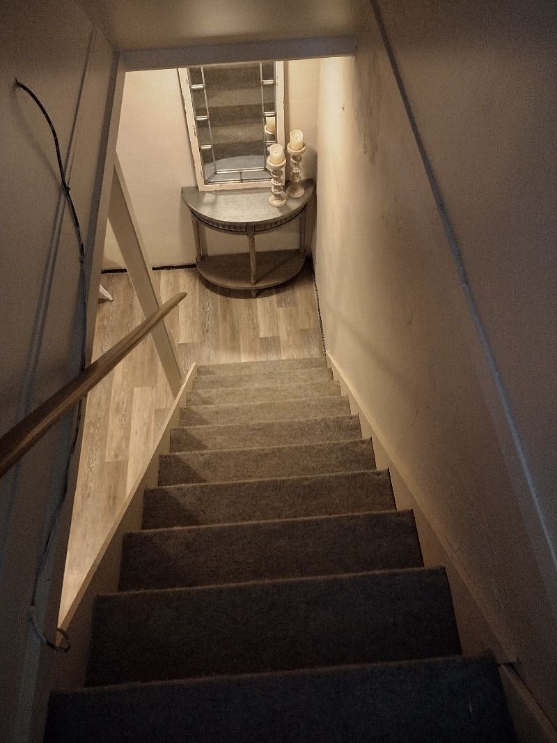 Staircase From Main Kitchen to Lower Level Living Area