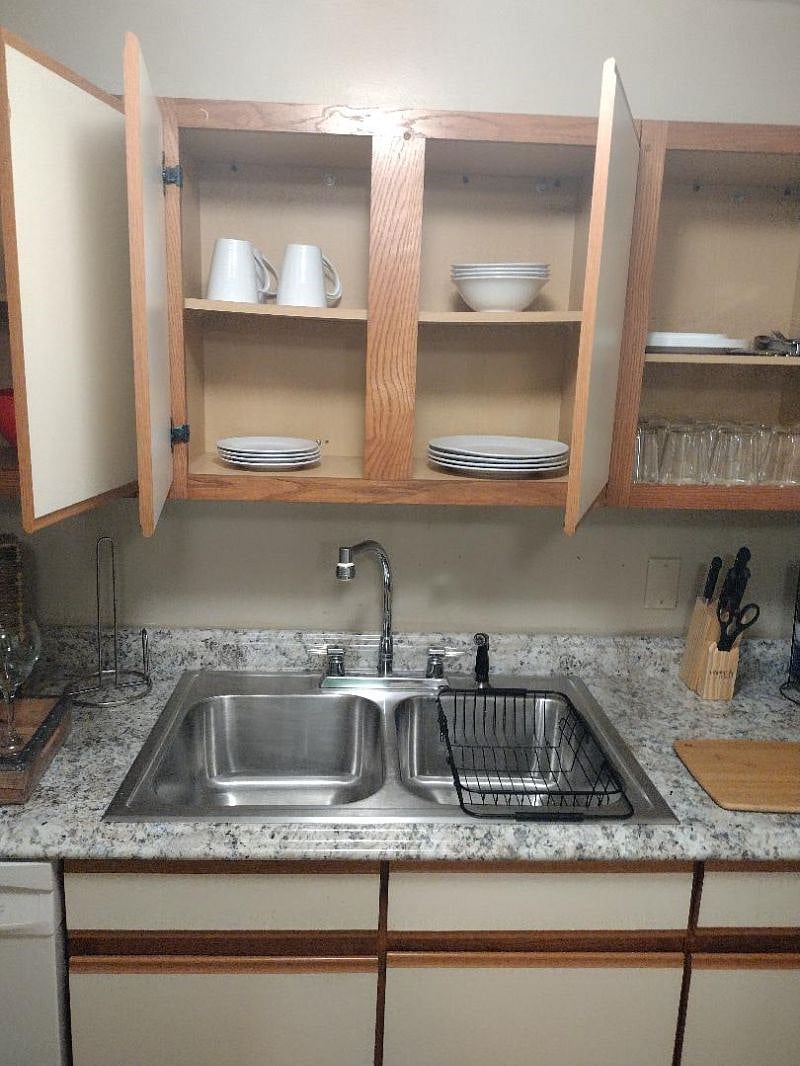 Lower Level Guest Kitchen Sink and Dishes and Cooking Bowls
