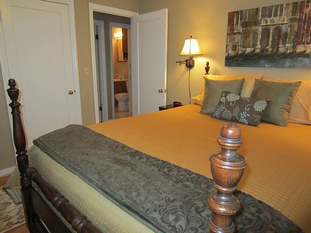 master bedroom, view across hall to bathroom