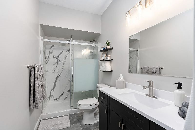Large shower with dual heads.