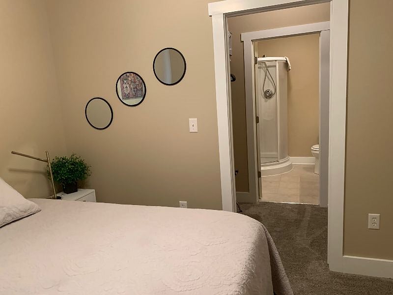 Second bedroom. View of entrance into the closet and ensuite bathroom.