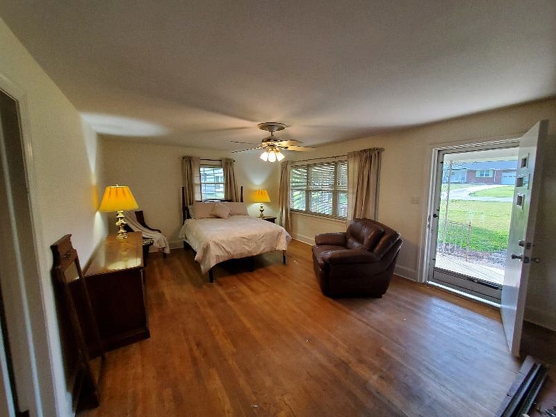 13 x 20 front bedroom with private porch and fireplace