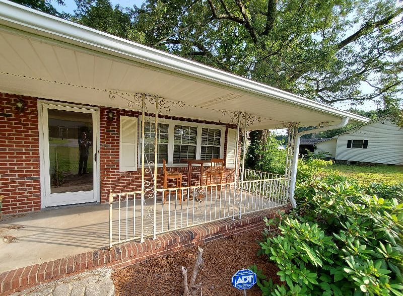 Front bedroom porch with high table.