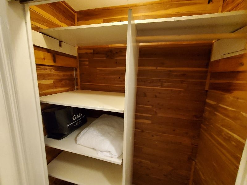 Cedar linen closet in hallway