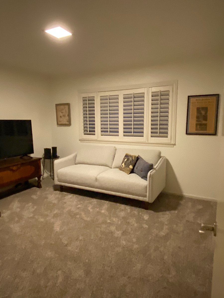 New couch and tv added to office.